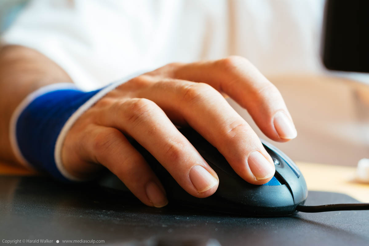 Stock photo of Using a computer mouse