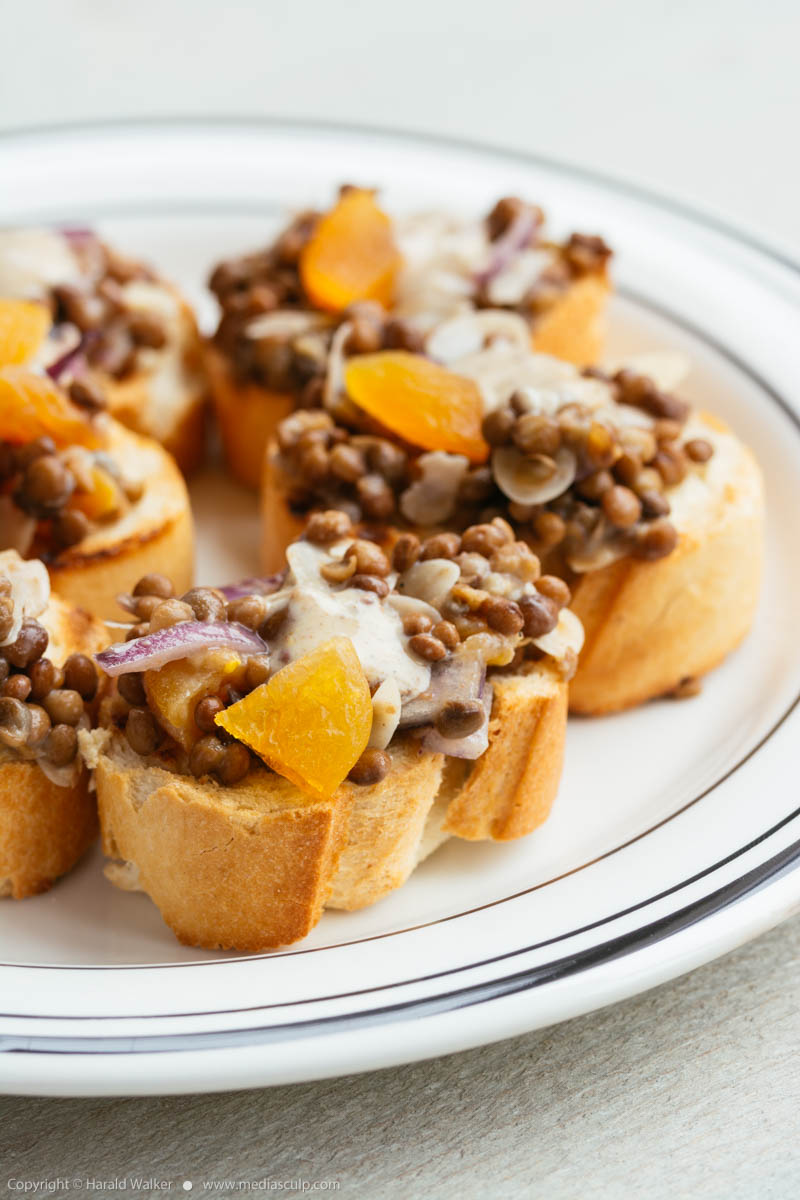 Stock photo of Lentil, Apricot Bruschetta with Curry Aioli