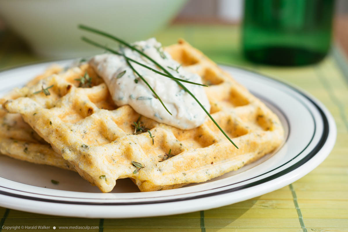 Stock photo of Savory waffles with herbed sauce