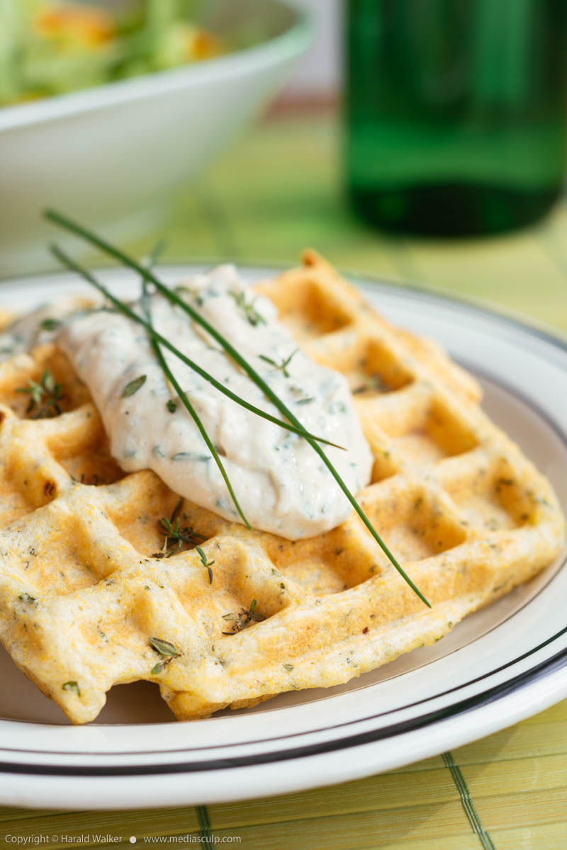 Stock photo of Savory waffles with herbed sauce