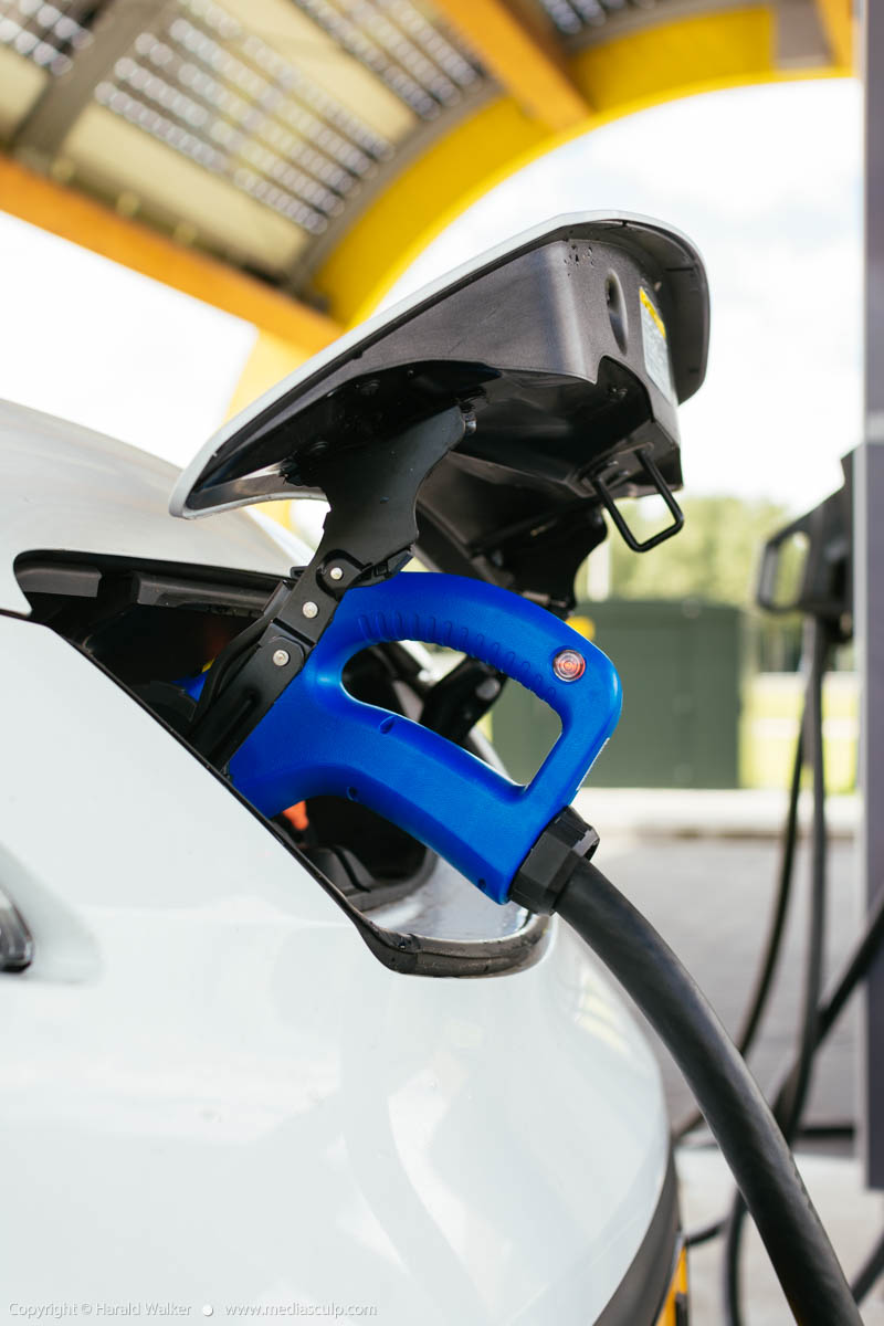 Stock photo of Fast charging an electric car