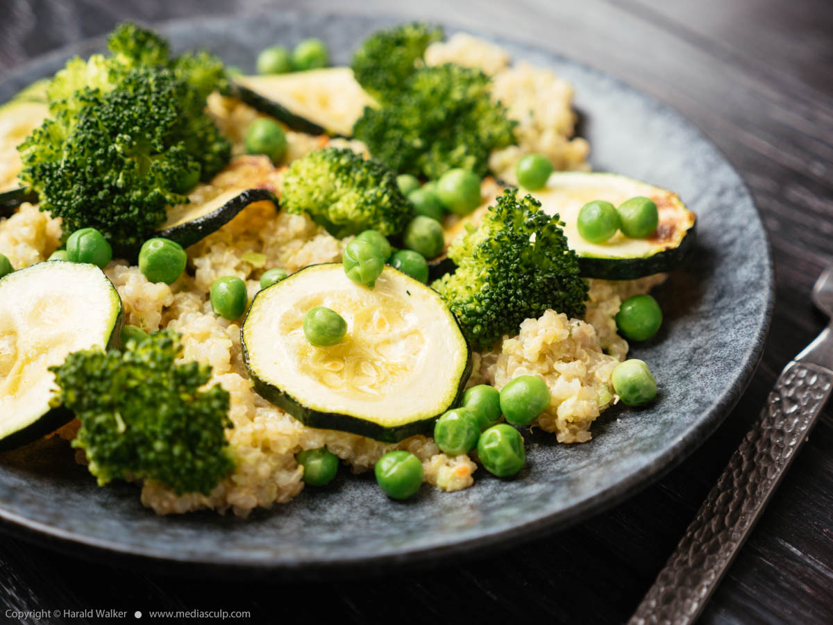 Stock photo of Quinoa with roasted zucchini, peas and broccoli