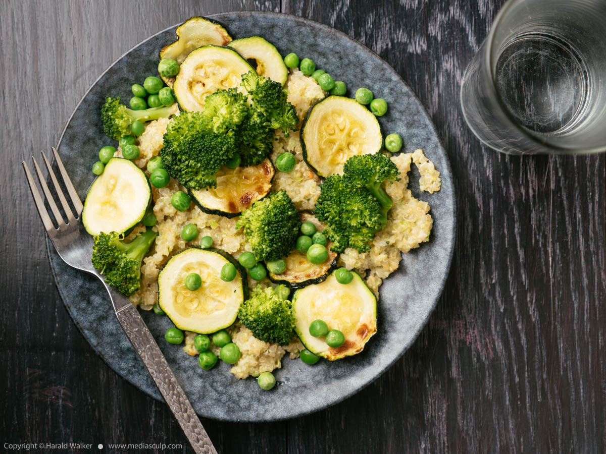 Stock photo of Quinoa with roasted zucchini, peas and broccoli