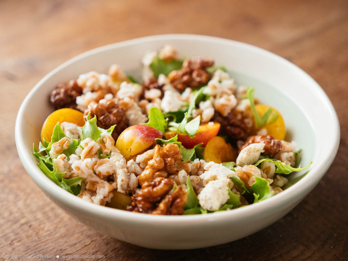 Stock photo of Farro Salad with Mirabelle Plums, Vegan Feta and Spicy Walnuts