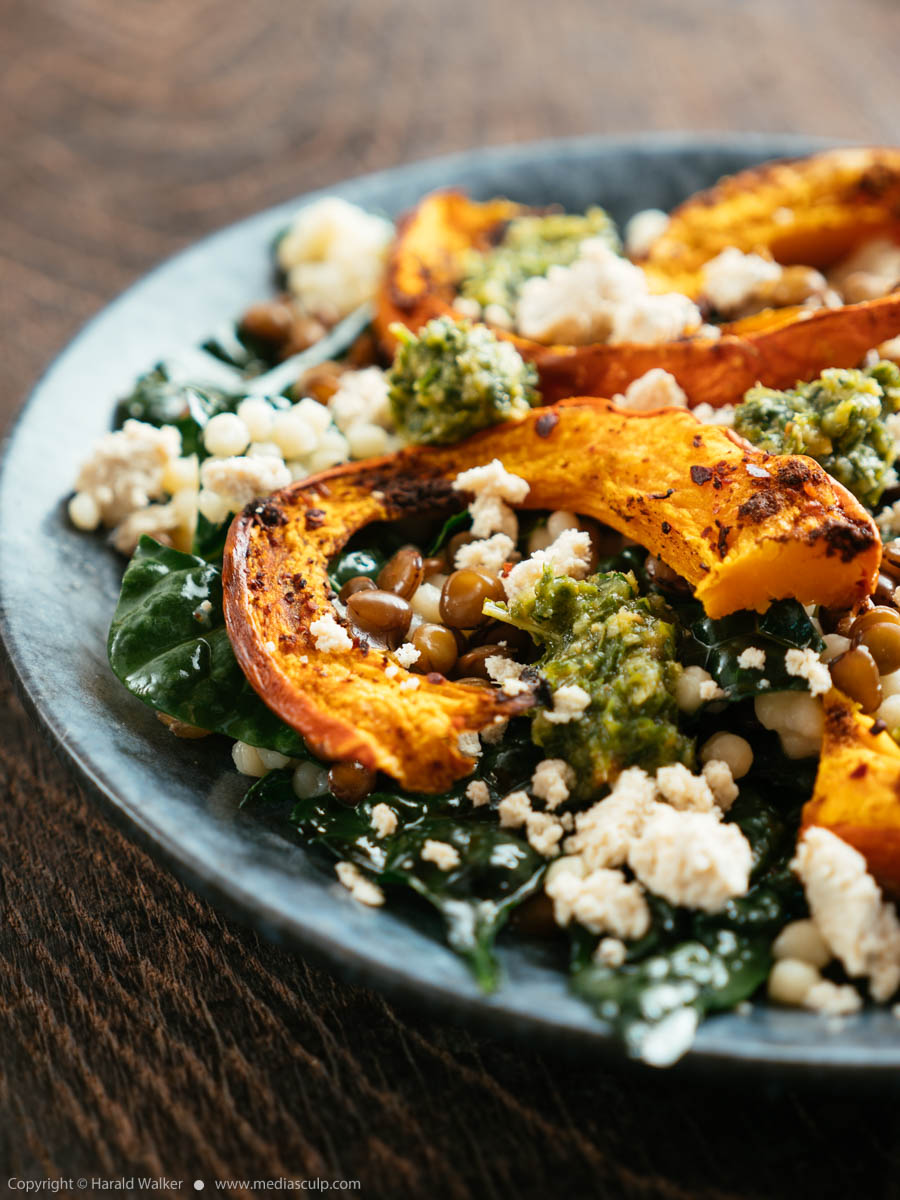 Stock photo of Roasted Squash On Couscous and Lentils with Kale
