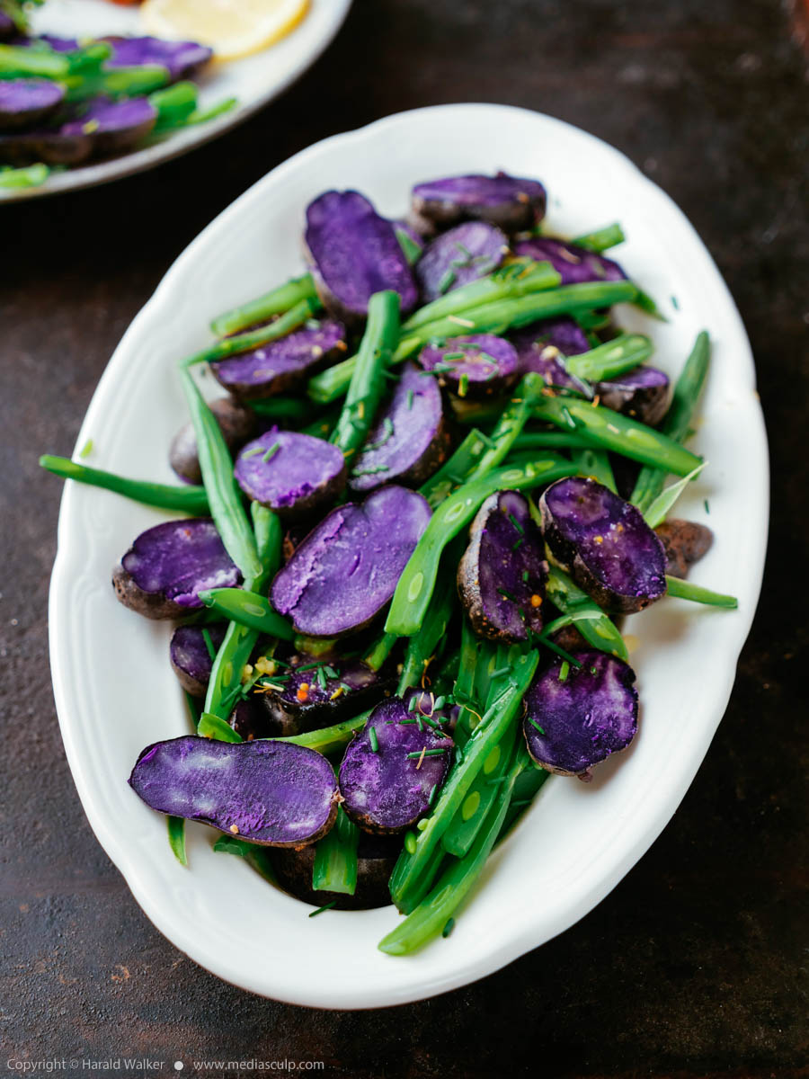 Stock photo of Purple Potatoes with Green Beans