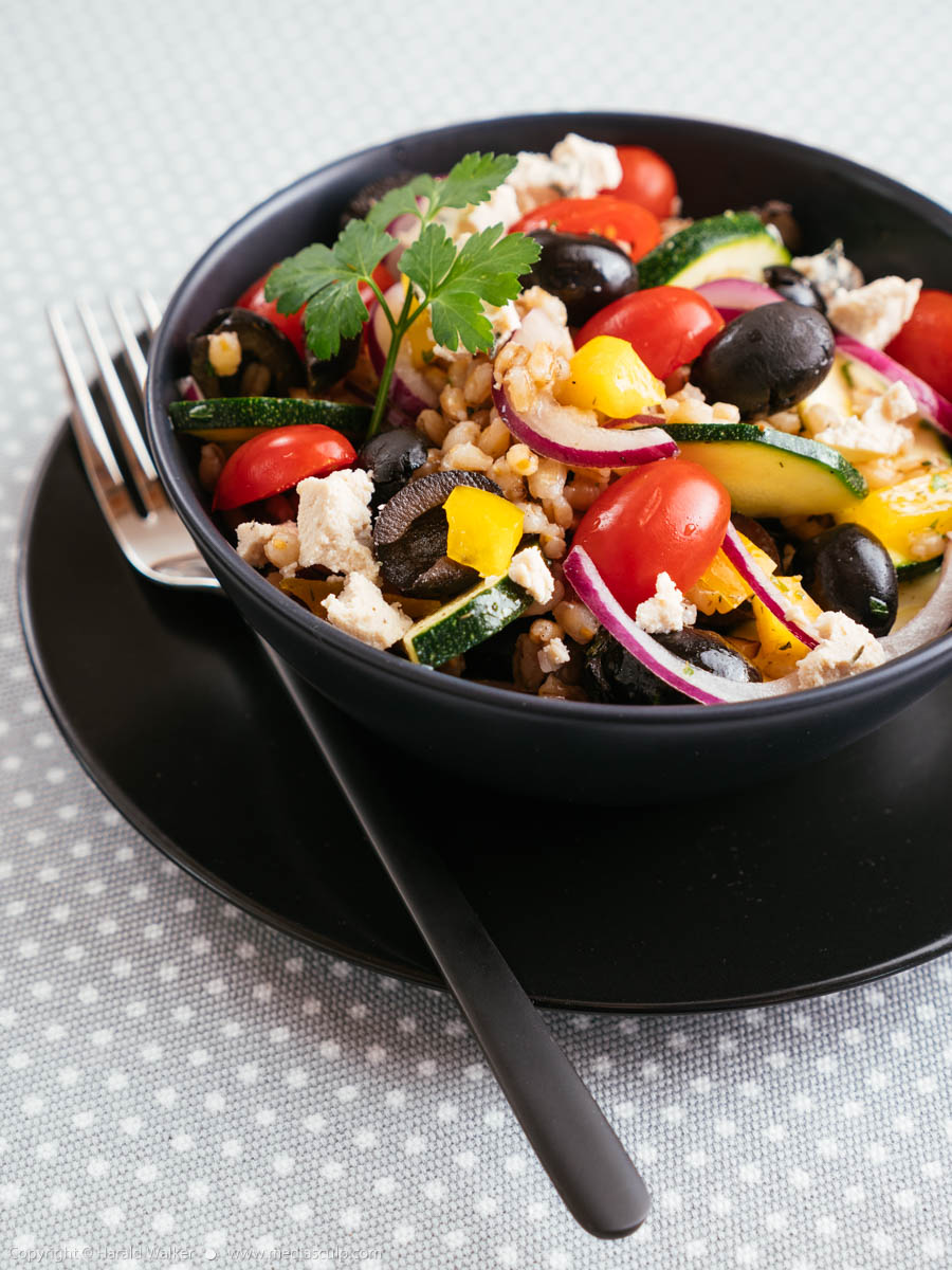 Stock photo of Greek Barley Salad with Vegan Feta