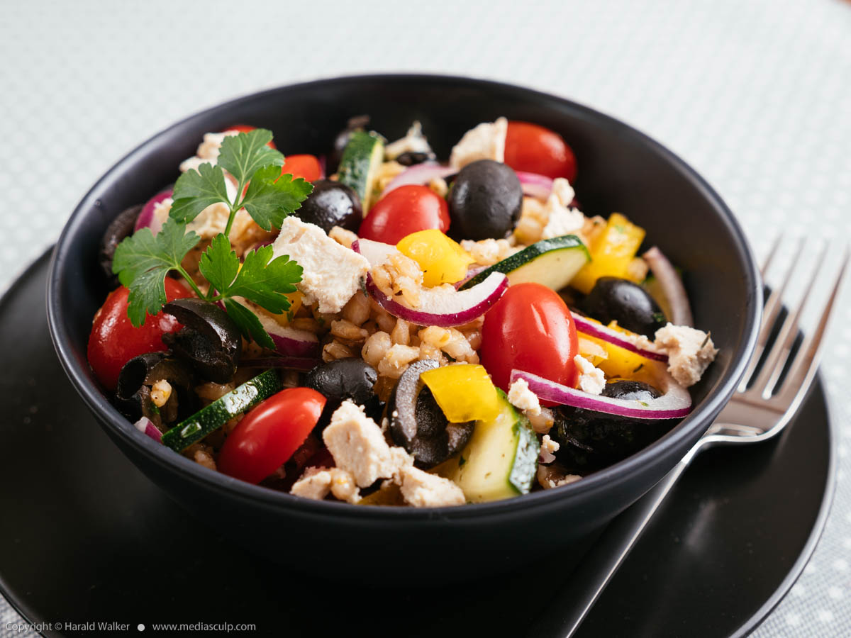 Stock photo of Greek Barley Salad with Vegan Feta