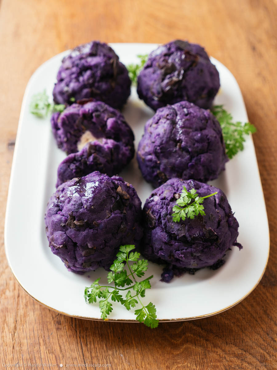 Stock photo of Purple Potaot Balls filled with Vegan Feta Cheese