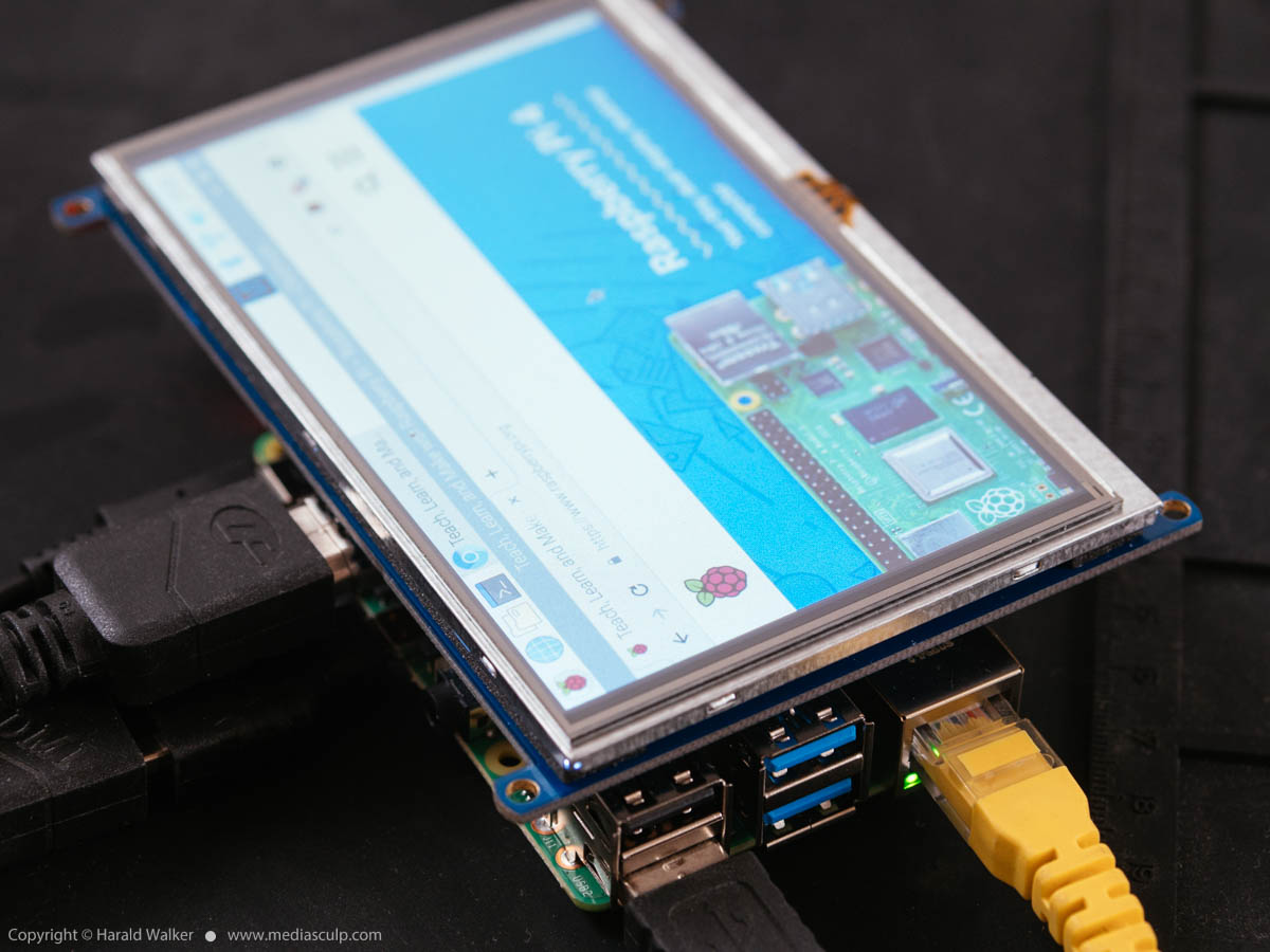 Stock photo of Raspbery Pi 4 with touchscreen