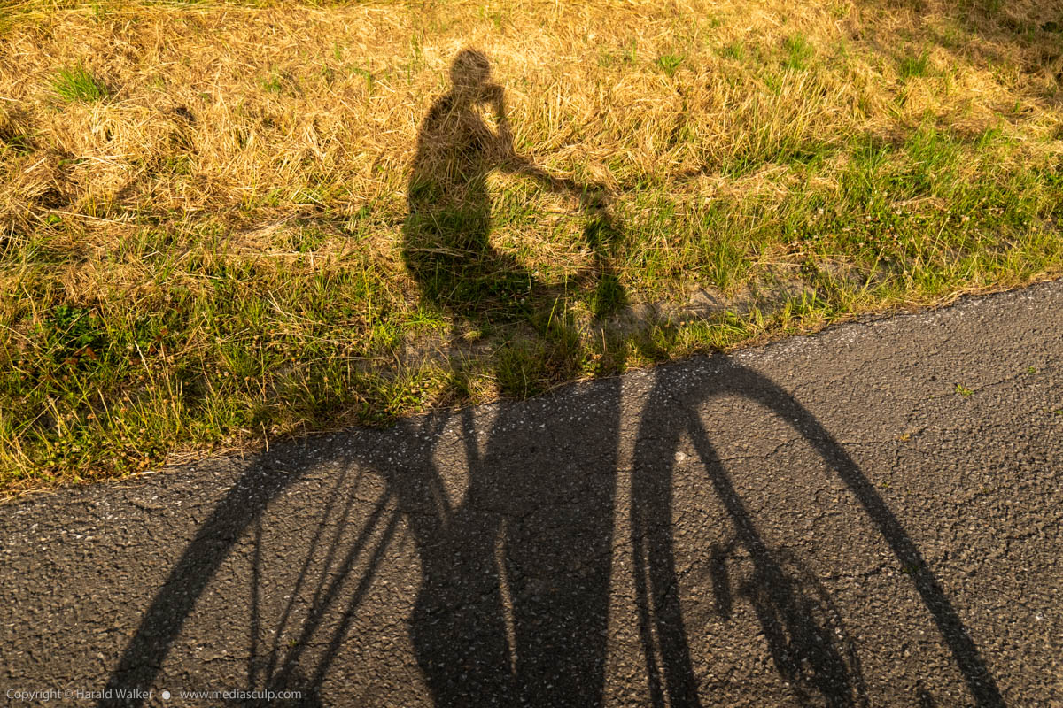 Stock photo of Shadow of a cyclist