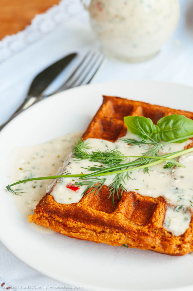 Stock photo of Bell Pepper Cornmeal Waffles with Herb Sauce