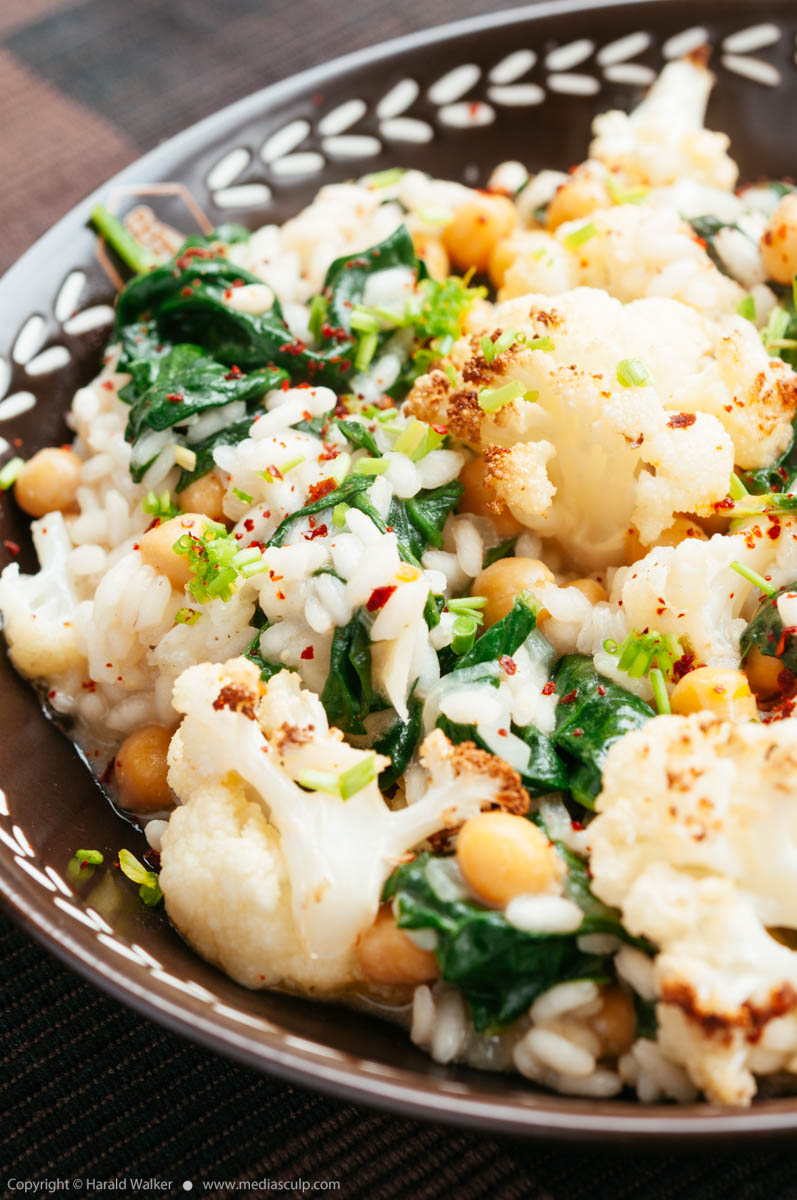 Stock photo of Roasted Cauliflower Risotto with Spinach and Chickpeas
