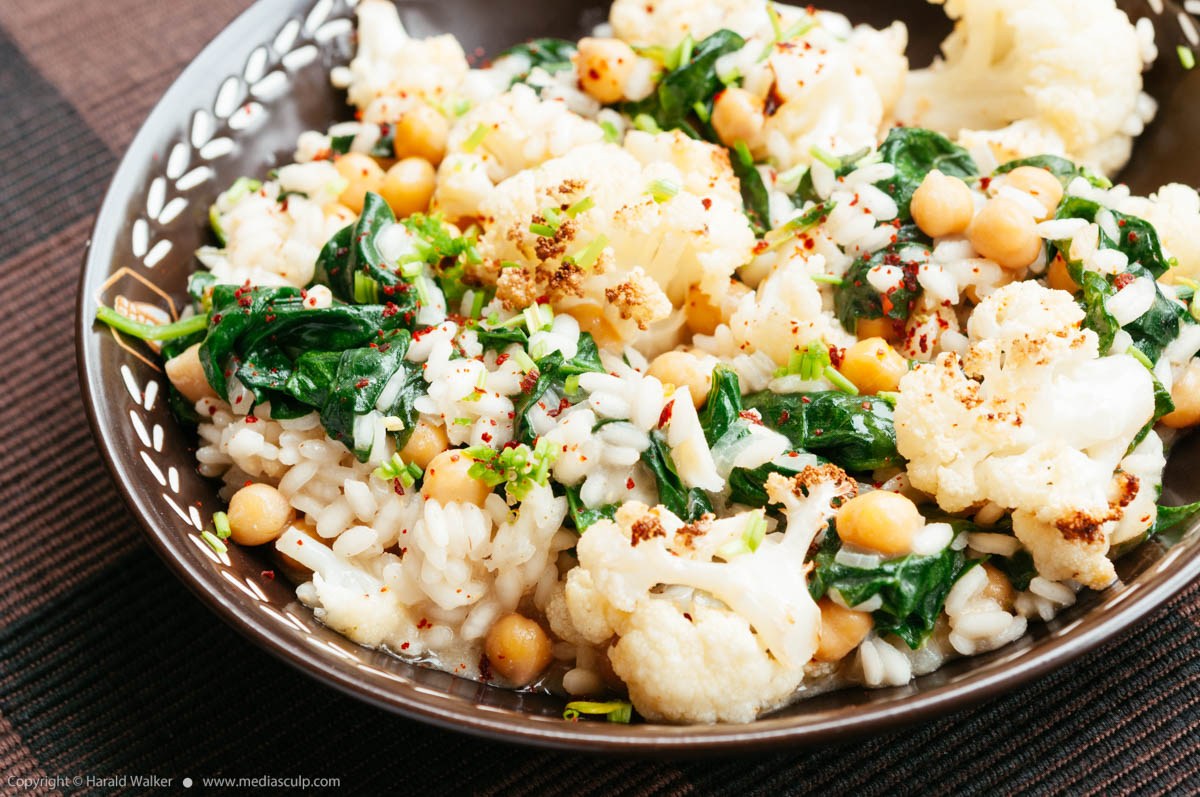Stock photo of Roasted Cauliflower Risotto with Spinach and Chickpeas