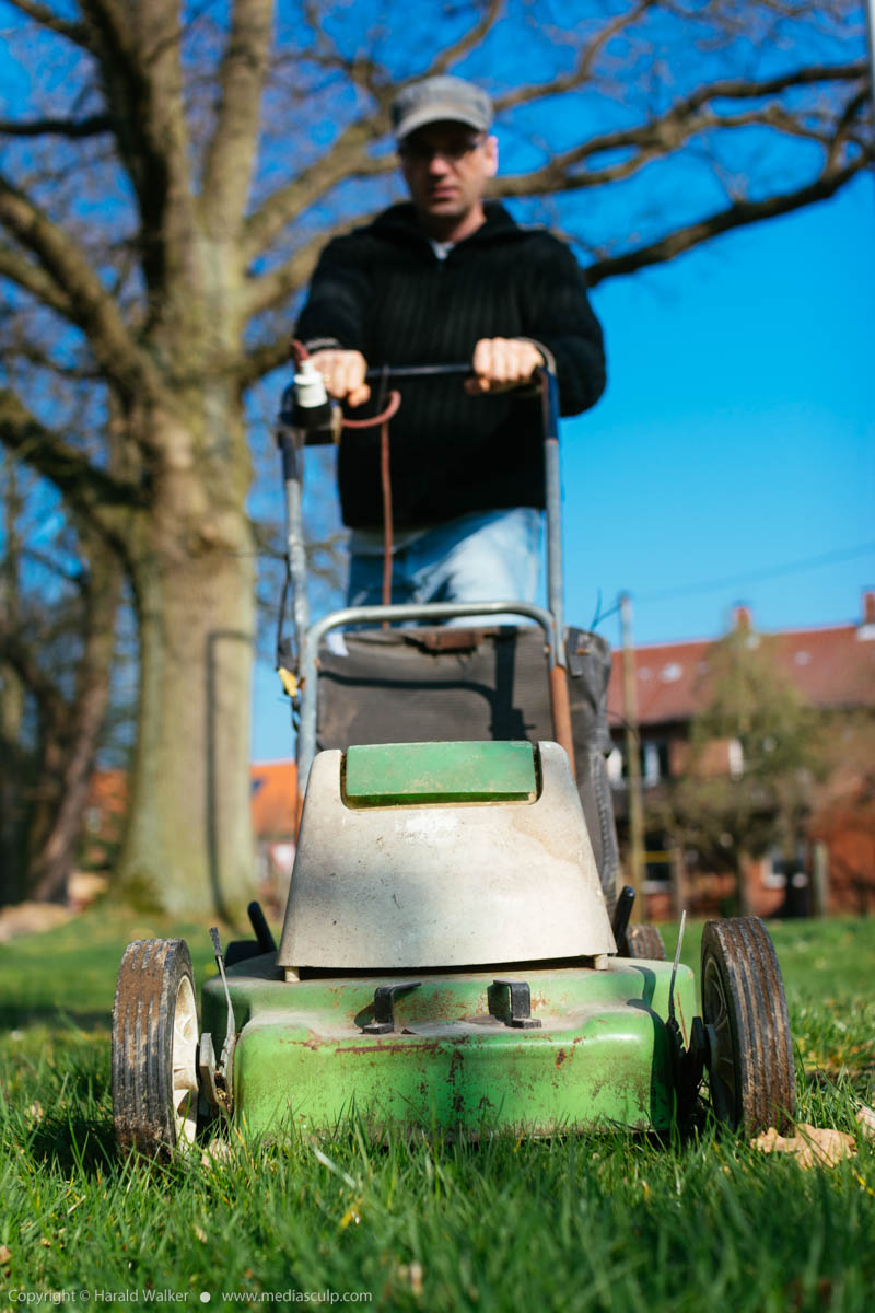Stock photo of Mowing lawn