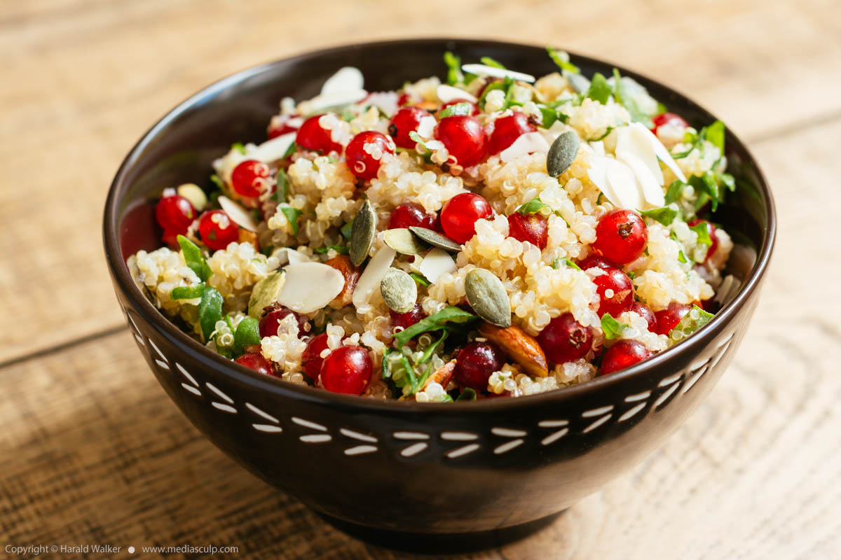 Stock photo of Quinoa, red currant salad with pumpkin seeds