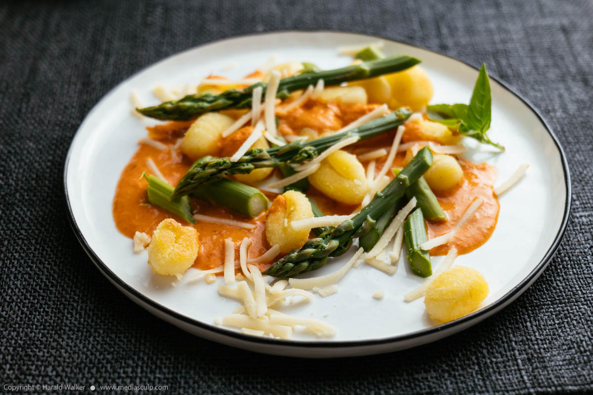 Stock photo of Gnocchi with Asparagus and Creamy Bell Pepper Sauce