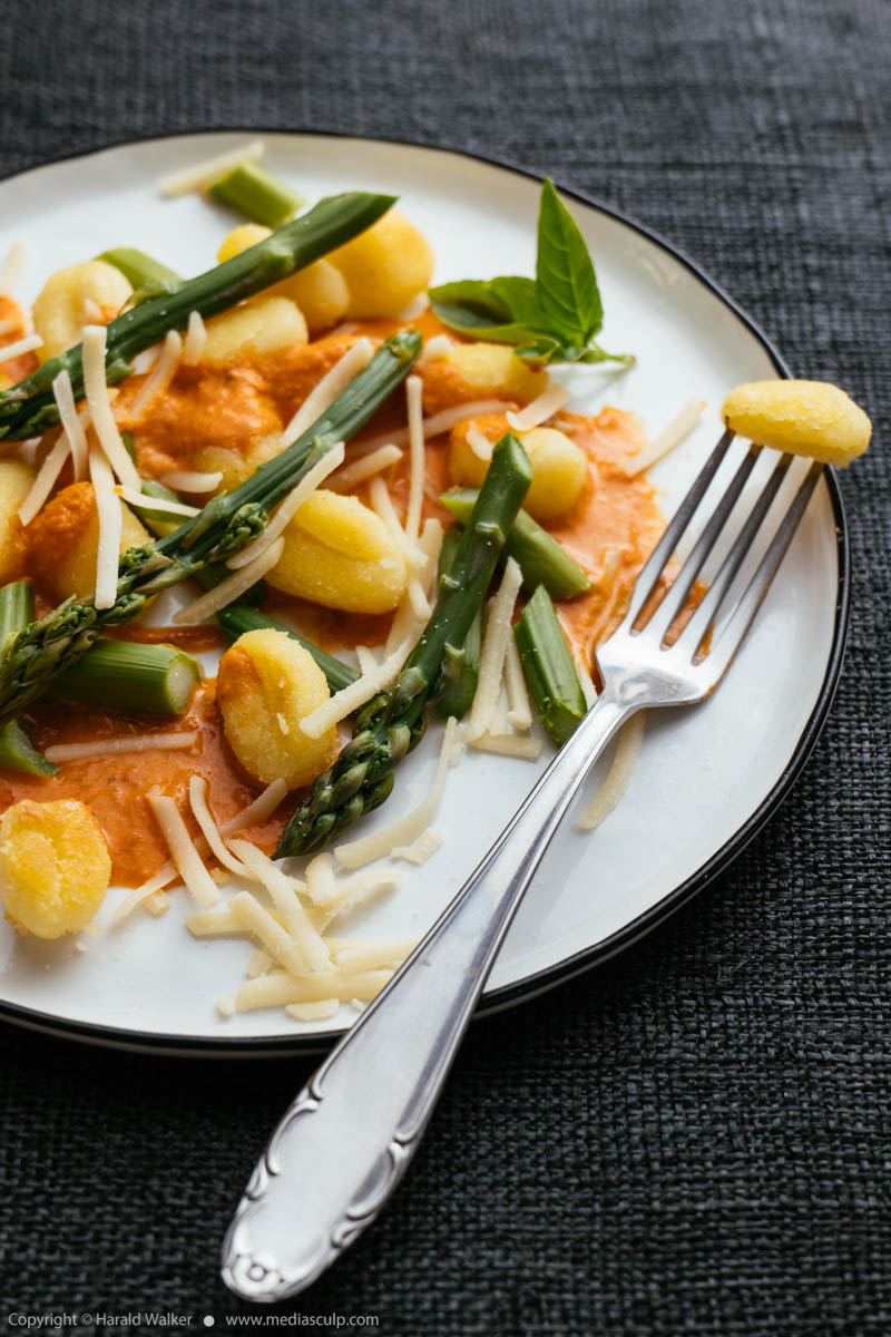 Stock photo of Gnocchi with Asparagus and Creamy Bell Pepper Sauce