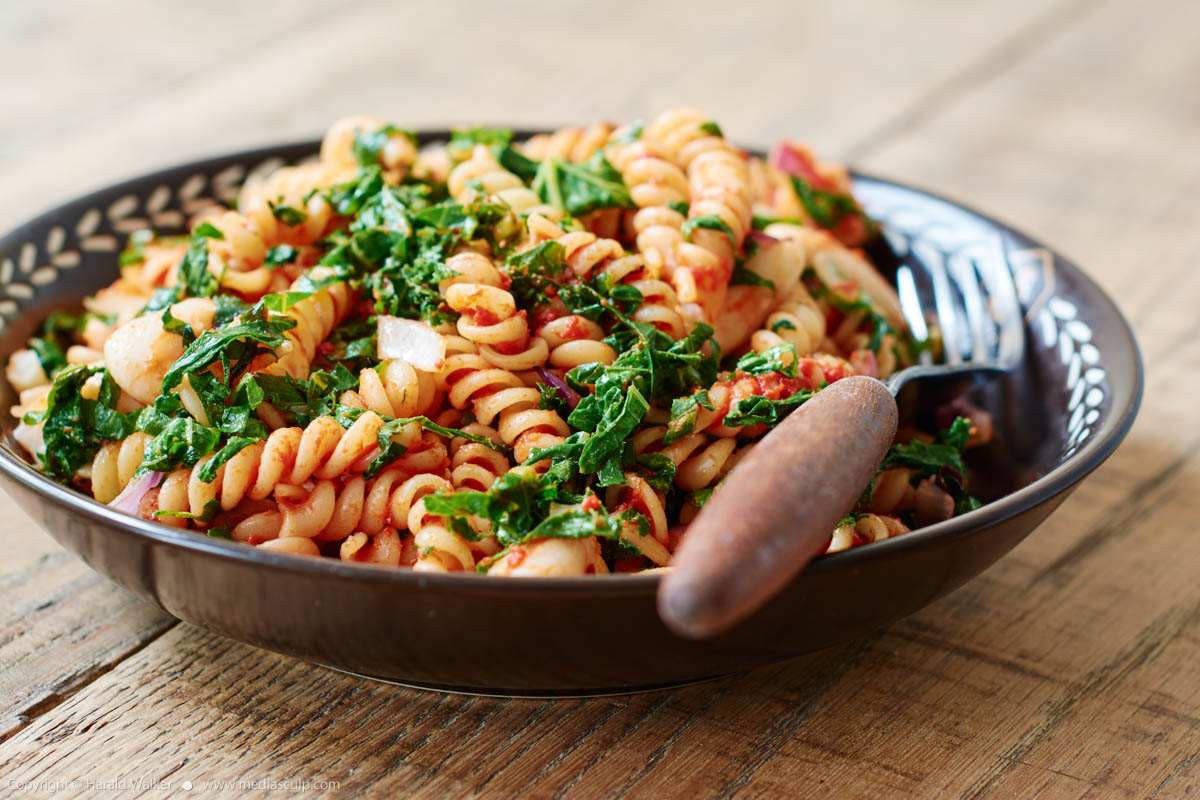Stock photo of Pasta with turnip greens and beans