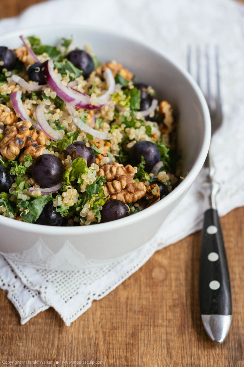 Stock photo of Quinoa, Kale, Grape, Salad with Walnuts