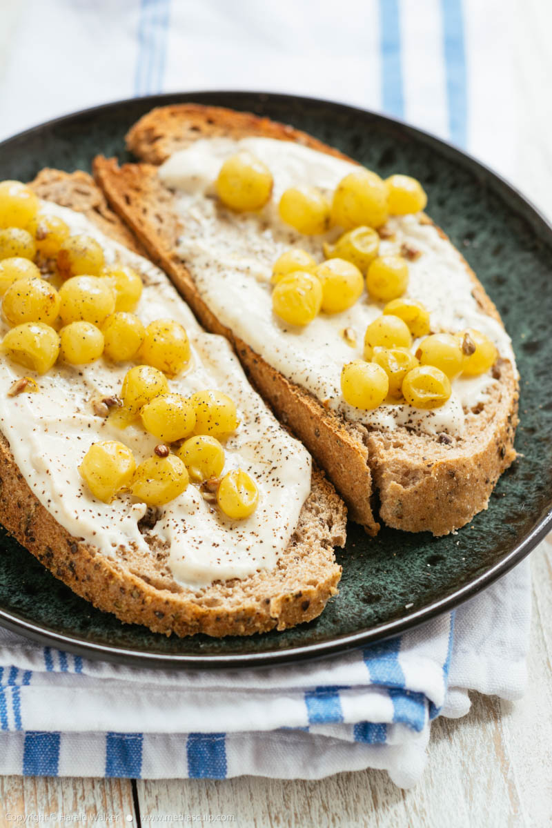 Stock photo of Crostini with Vegan Ricotta and Roasted Grapes