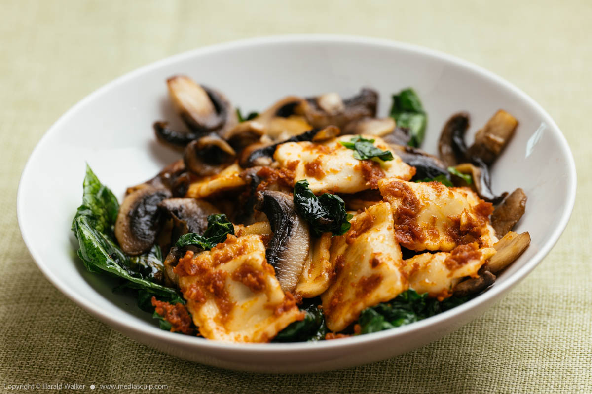Stock photo of Ravioli with spinach and mushrooms