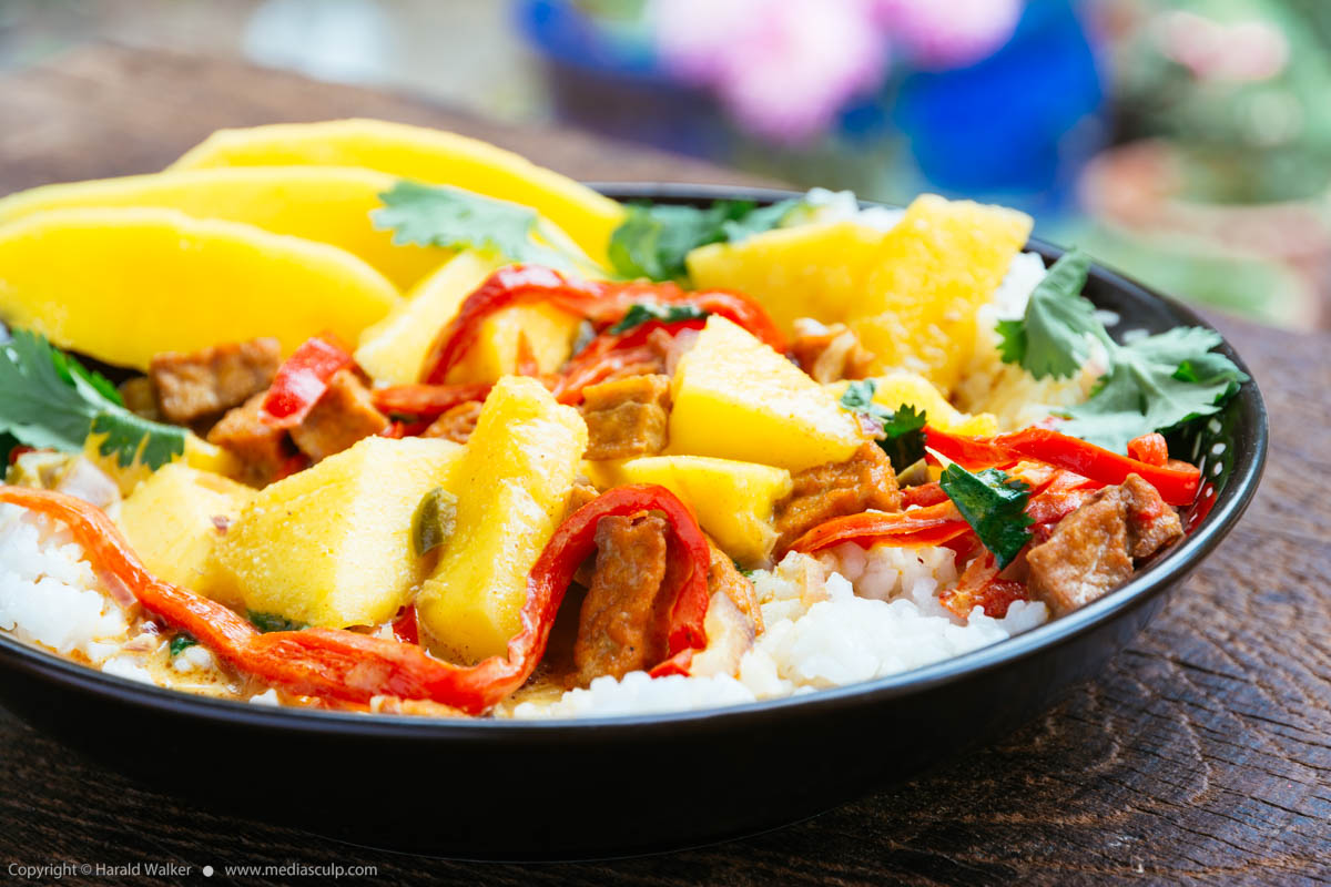 Stock photo of Mango and Spicy Tofu in Coconut Curry Sauce