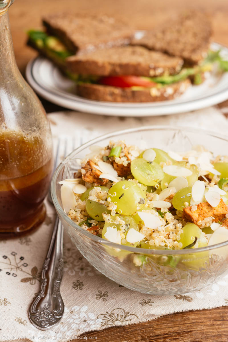 Stock photo of Quinoa salad with smoked tofu, grapes and almonds