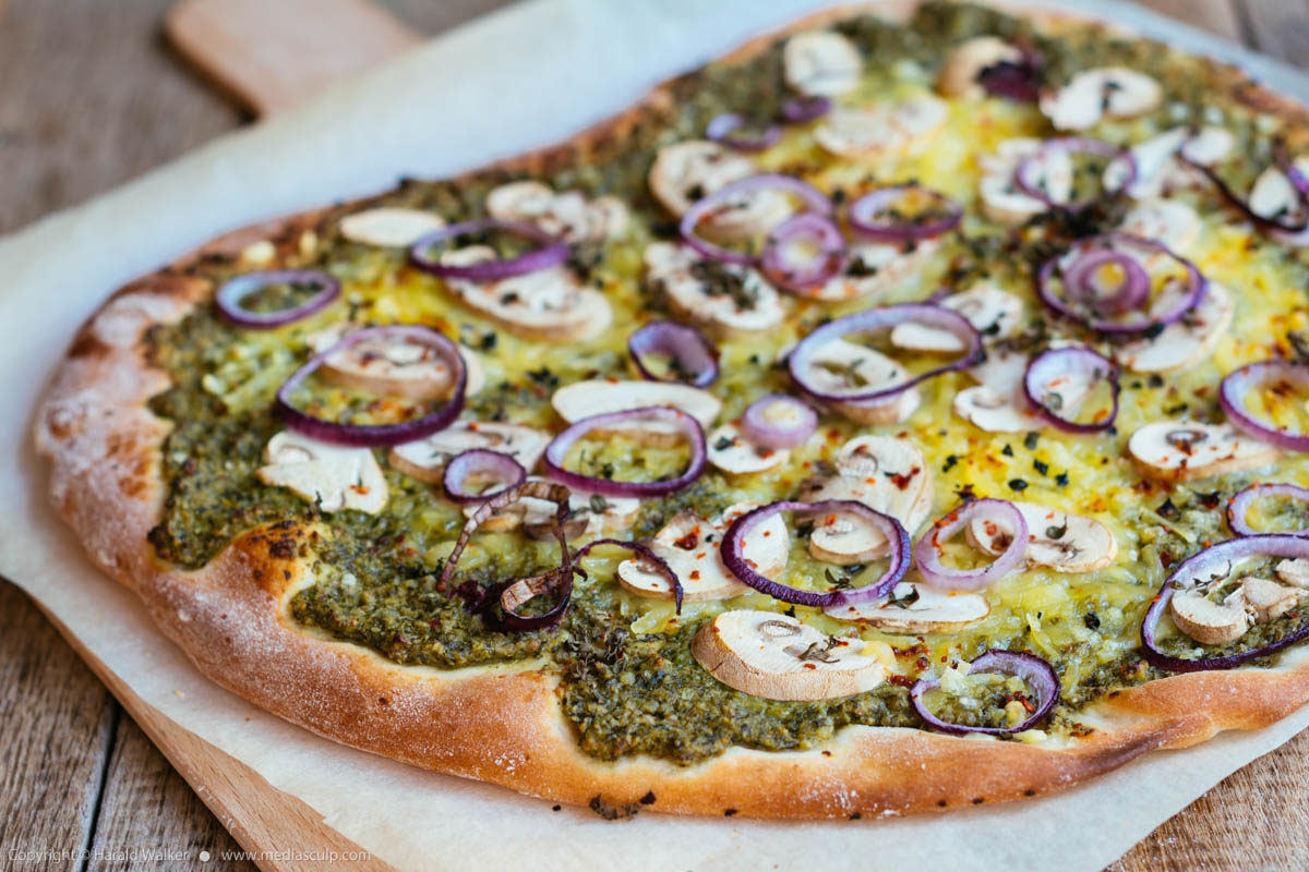 Stock photo of Rucola and basil pesto pizza