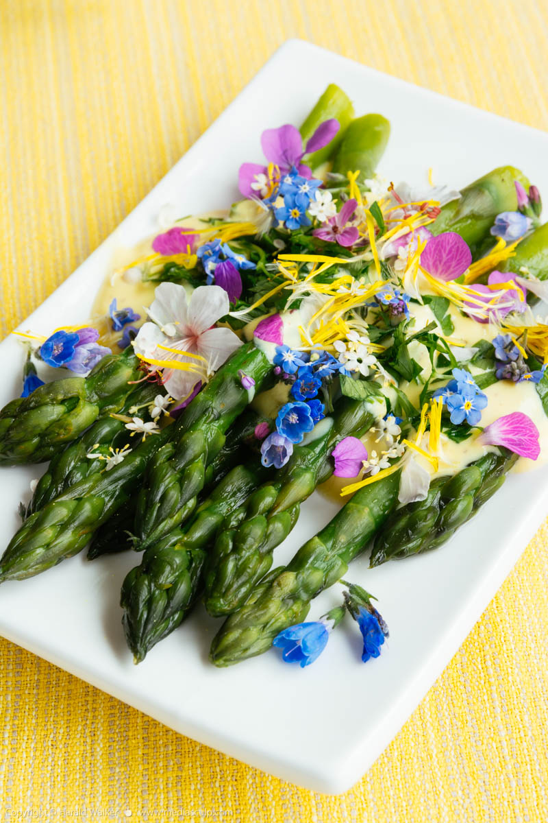 Stock photo of Green asparagus with a saffron sauce